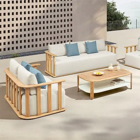 Conjunto de muebles de exterior con sofá y mesa Pallisad en terraza moderna en Mallorca